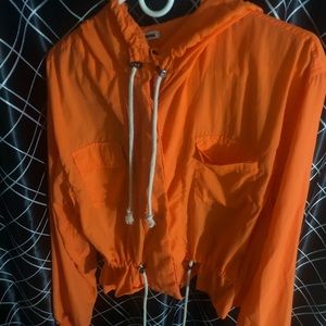 Orange windbreaker